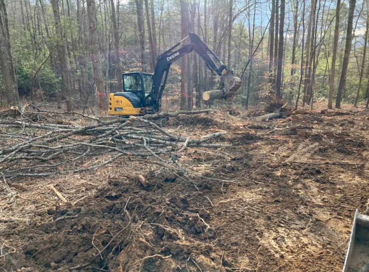 Land clearing and forestry mulching with excavator