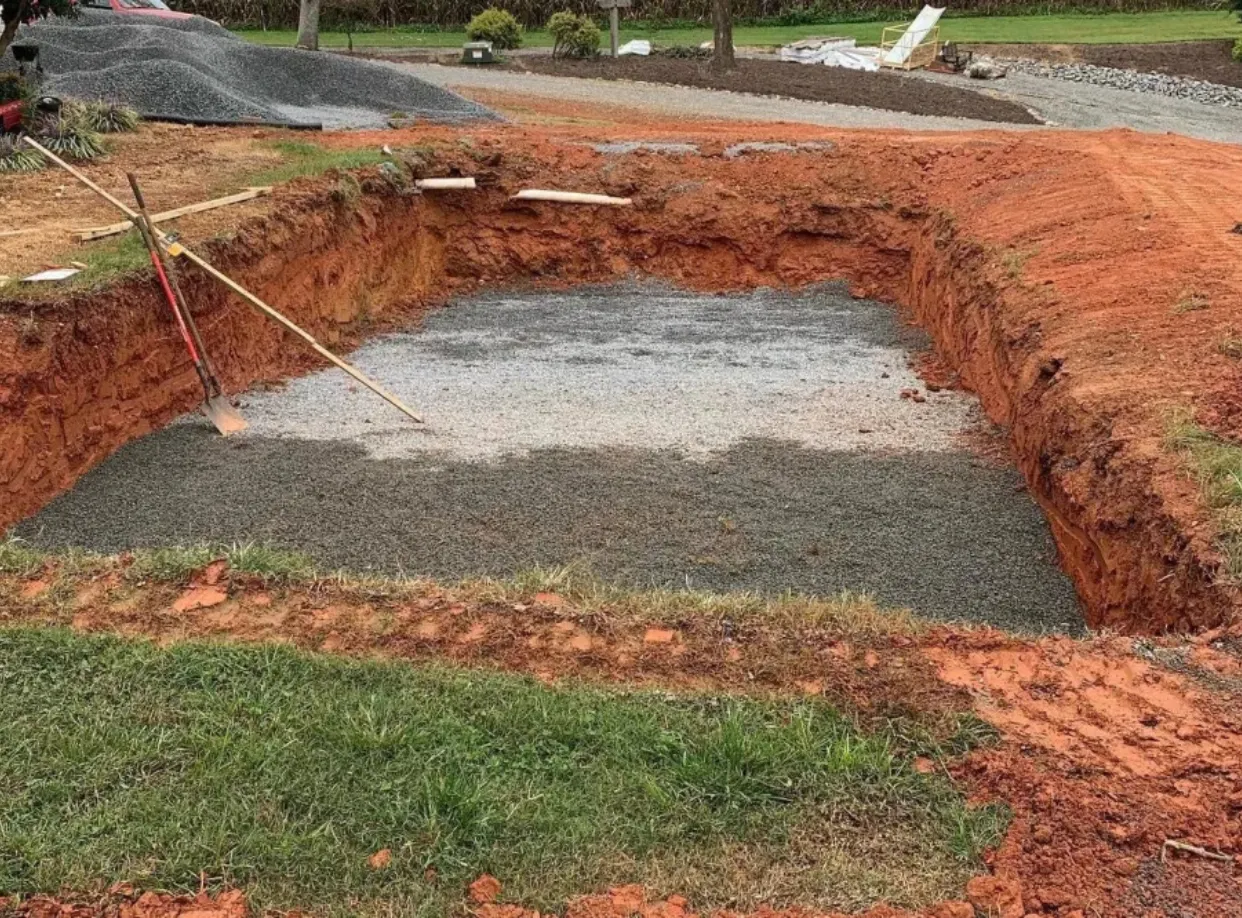 Septic system installation with gravel base preparation