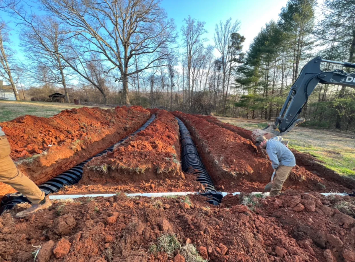Large-scale septic field installation with professional team